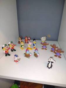 lot 17 image: Vintage figures, Chip and Dale, Goofy,  Donald Duck, Scroodge McDuck, General Mills Berry Bear, Gummi Bear Cubbi and Tummi