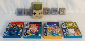 lot 6 image: Vintage Nintendo Game Boy with Kirbys Dream Land, Mega Man, Tetris, Double Dragon and Super Mario Land