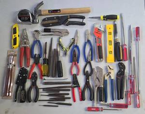 lot 263K image: G - Large Hand Tool Assortment Including Pliers, Screwdrivers, Wrenches, Crimpers, and Level