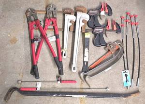 lot 461K image: G - Hand Tool Lot with Pipe Wrenches, Bolt Cutters, Clamps, Pry Bars, and Drain Clog Tools