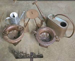 lot 464K image: G - Garden Decor Collection 2 Victorian Urns, Watering Cans, and Decorative Bracket