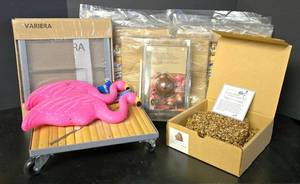 lot 574K image: G - Garden Supplies Collection with Plant Stands, Flamingos, and More