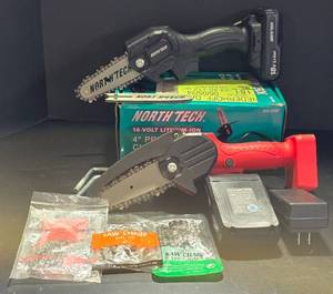 lot 663K image: G - Pair of North Tech 4-Inch Pruning Chainsaws with Batteries, Charger, Extra Blade and Chains