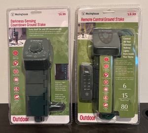 lot 30R image: S - New Westinghouse Darkness-Sensing Countdown and Remote Control Ground Stakes