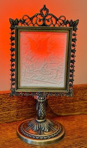 lot 59D image: Ornate Metal Picture Frame Lamp on Pedestal Stand - Embossed Relief Panel
