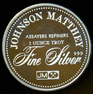 lot 4 image: 1984 Johnson Matthey 1oz 999 Silver 25yrs Alaska Statehood Round