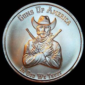 lot 7 image: Mint Error, 1oz 999 Guns Up Silver Round - Stamped as 12oz