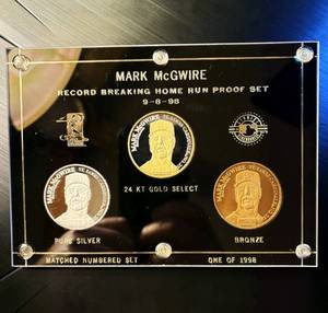 lot 9 image: 1998 Proof Mark McGwire Record Home Run Coin Set, Includes (2) 1oz 999 silver rounds, 1,988 Minted
