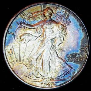 lot 18 image: Uncirculated 1943 Walking Liberty Half Dollar, Original Bank Roll, Deep Rainbow Toning