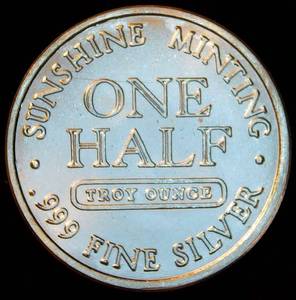 lot 41 image: 12oz 999 Silver Sunshine Minting Round