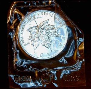 lot 52 image: Mint Sealed 1oz 1989 $5 Canada 9999 Maple Leaf, Better Date