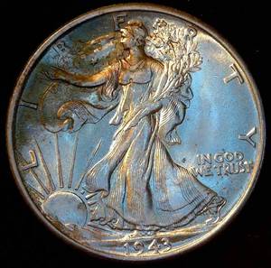 lot 57 image: Uncirculated 1943 Walking Liberty Half Dollar, Original Bank Roll, Slight Toning
