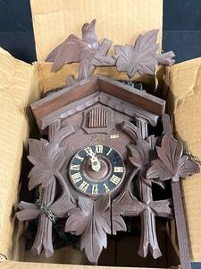 lot 100 image: Vintage Wooden Cuckoo Clock with Carved Bird and Leaf Details