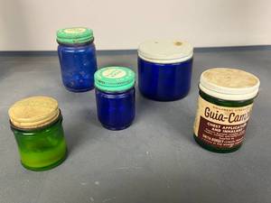 lot 118 image: Set of 5 Vintage Apothecary Jars - Vicks, Guia-Camph, Mentholatum, Cobalt and Green Glass
