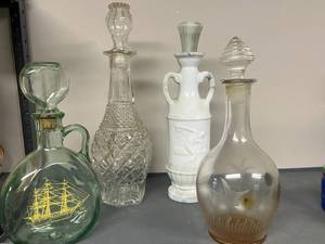 lot 119 image: Set of 4 Vintage Glass and Porcelain Decanters Assorted Designs