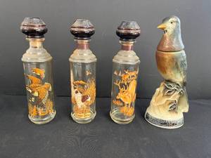 lot 132 image: Set of 3 Cabin Still Wildlife Decanters and Beams Trophy Bird Bottle