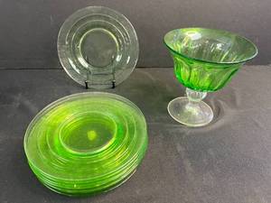 lot 157 image: Set of 9 Green Depression Glass Plates with Matching Dessert Cup