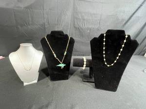 lot 216 image: Set of Gold Tone Jewelry Pieces with Whale Pendant Necklace and Faux Pearls