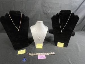 lot 223 image: Jewelry Collection Sterling Marvel Necklace, Trifari Bracelet, Anchor Pendant