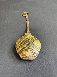 lot 70 image: Vintage Fan-Shaped Compact Purse with Floral Detail