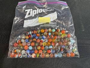 lot 32 image: Bag of VTG Assorted Glass Marbles 1.3 lbs