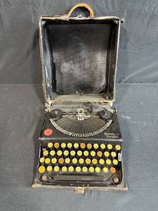 lot 40 image: Vintage Remington Portable Typewriter with Carry Case - untested