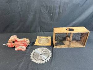 lot 42 image: Workbench Tool Lot with Craftsman Vise, Circular Saw Blades, and Wooden Trap Cage