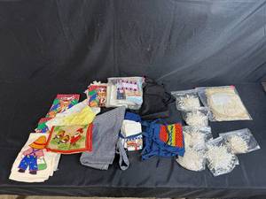 lot 46 image: Collection of Vintage Kitchen Linens, Aprons, Holiday Towels, and Lace Trims