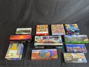 lot 50 image: Lot of Assorted Jigsaw Puzzles Scenic and Themed 350-750 Piece