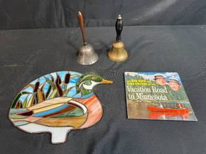 lot 81 image: Vintage Mixed Lot Stained Glass Duck Suncatcher, 2 Hand Bells, Vacation Road to Minnesota Record