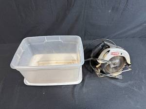 lot 87 image: Craftsman 7-14 Inch Circular Saw Model 315.10860 with Storage Bin