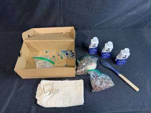 lot 96 image: Tie-Dye Kit with 3 Bottles Indigo Rit Dye, Fabric, Rubber Bands, Marbles, Wooden Spoon - contents unverified