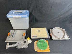 lot 106 image: Inland Glass Art Grinder Lot with Tray, Grid Surface, Blade, and Storage Container