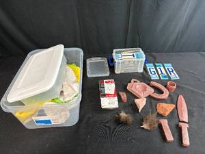 lot 159 image: Mixed Lot of Vintage License Plates, Stone Carvings, and Miscellaneous Items in Storage Bins