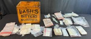 lot 180 image: Vintage Lashs Bitters Wooden Box with Assorted Small Plastic Baggies