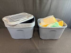lot 188 image: Lot of 2 Large Plastic Storage Totes with Lids and Assorted Packing Materials
