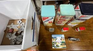 lot 216 image: Vintage Kitchenware Collection with Nabisco Tins, Spice Tins, Cookie Cutters, Yellowstone Tile, and Gravy Boat