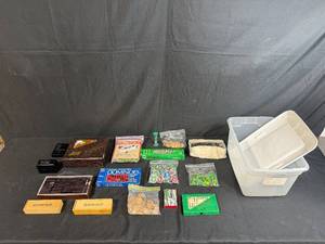 lot 114 image: Assorted Board Game Pieces, Dominoes Sets, Poker Chips, and Storage Bin