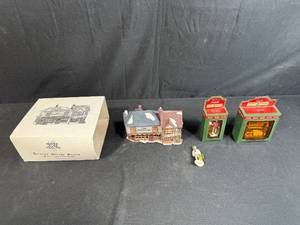lot 227 image: Coca-Cola Town Square Collection Figurines and The Old Curiosity Shop Village Building