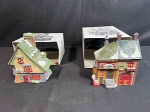 lot 228 image: Set of 2 Department 56 North Pole Series Heritage Village Porcelain Buildings