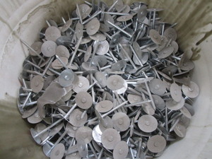 lot 303 image: 2 Insulation Weld Pins 12 Full 5gal Bucket