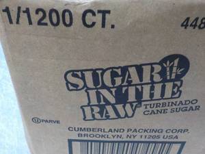 lot 2 image: Case of 1200 packets Sugar in the R...