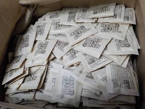 lot 1 image: Case of 1200 packets Sugar in the R...