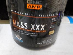 lot 105 image: 6.1 lb. Jug GNC MassXXX Muscle Perf...