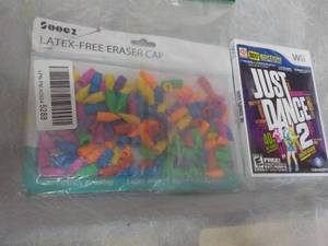 lot 117 image: Latex Free Eraer Caps and Wii Game...