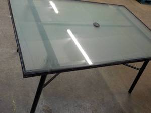 lot 236 image: Glass Top Patio Table 36 x 48 with...