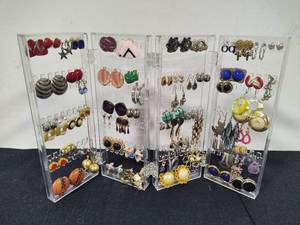 lot 57 image: Large Lot of Assorted Earrings  Holder