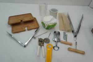 lot 28 image: Cutting Boards, Coffee Filters Creamer, Tongs and Other Cooking Utensils