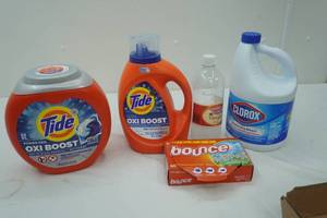 lot 30 image: Tide (not full), Bleach, Bounce, White Distilled Vinegar.