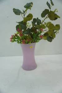 lot 55 image: Flared, Bowtie-shaped glass vase in glossy purple. 8 tall by 5 diameter